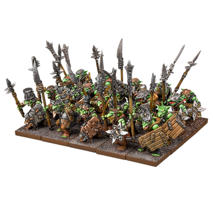 A group of green-skinned goblin miniatures in armor, holding spears and shields, ready for fantasy combat