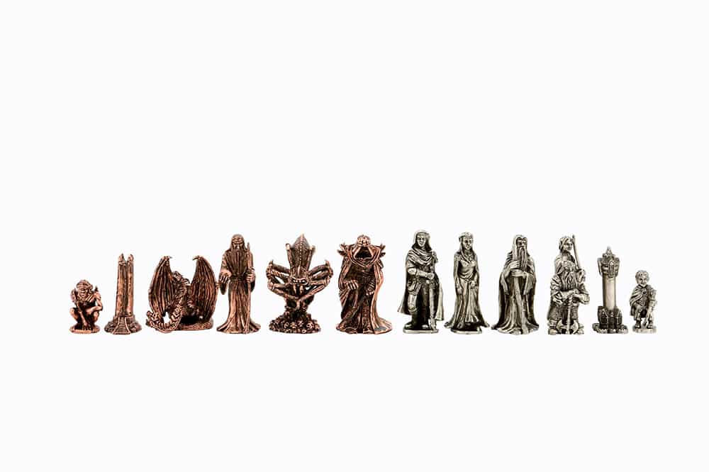 Twelve Dal Rossi Evil Ring Metal Chessmen are arranged in a row, with dark bronze figures on the left and silver figures on the right