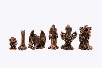 Six fantasy-themed Dal Rossi Evil Ring Metal Chessmen are displayed, featuring a creature, tower, dragon, wizard, spider-like figure, and hooded ghoul in a row