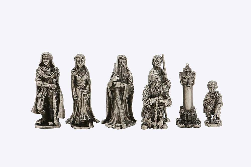 Six silver metal Dal Rossi Evil Ring Metal Chessmen depicting various fantasy characters and a tower