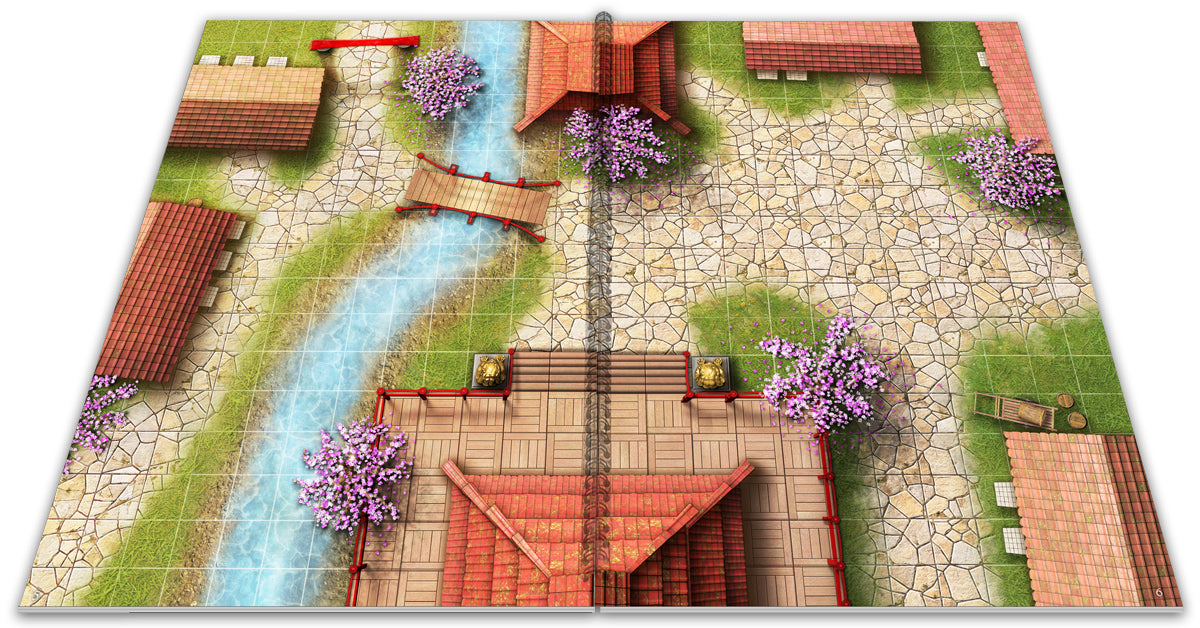 Overhead view of a grid-based Japanese village tabletop mat with a river, bridge, buildings, and cherry blossoms