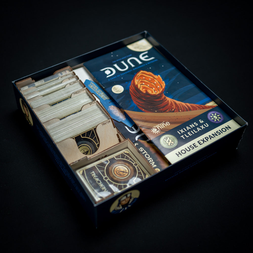 Laserox wooden insert partially loaded with Dune game parts