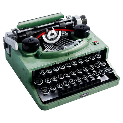 Detailed brick model of a vintage typewriter in dark green, showing the keys and carriage