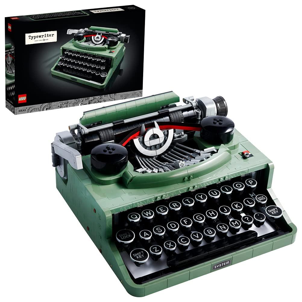 Detailed green LEGO model of a vintage typewriter shown next to the retail packaging