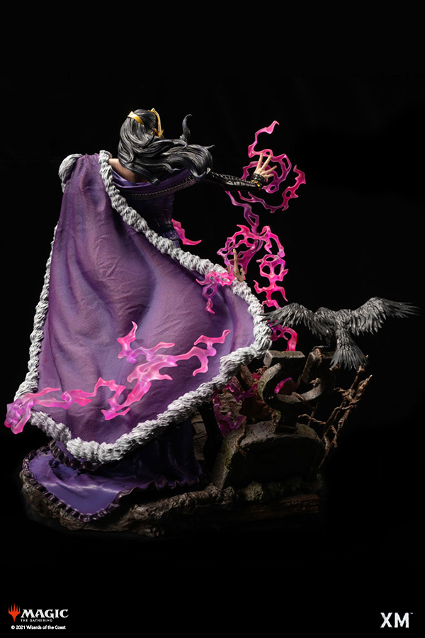 Magic: The Gathering statue of a sorceress in a purple, fur-trimmed cape, casting pink magic, with a black raven