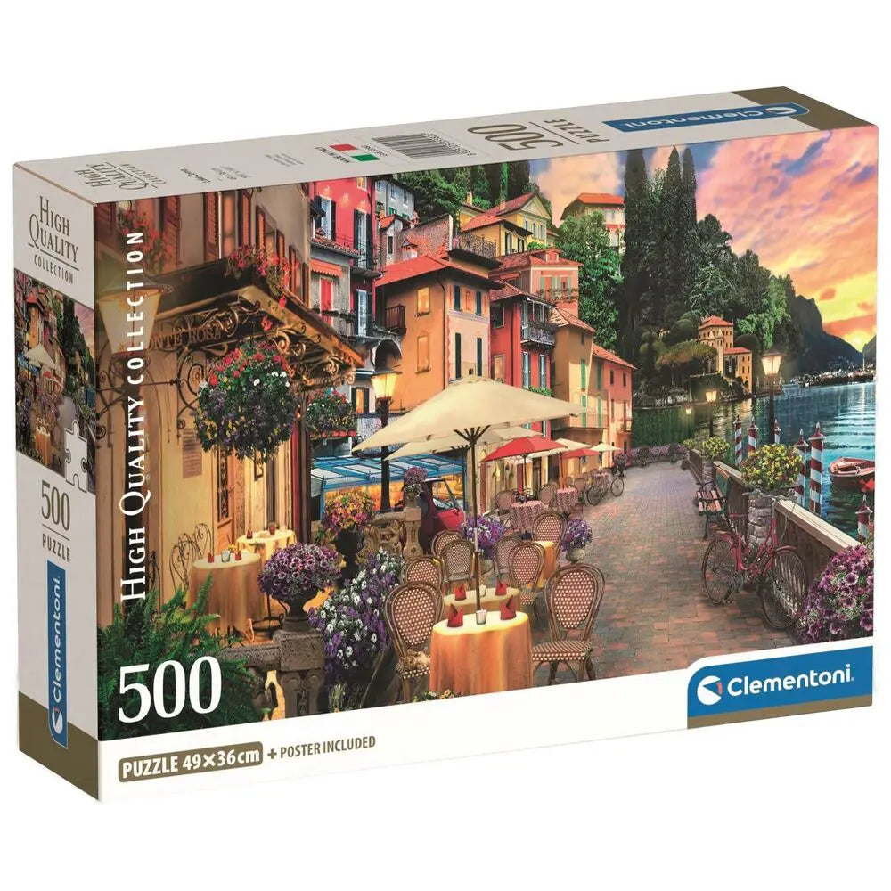 Puzzle box showing a vibrant Italian lakeside town with outdoor cafes, colorful buildings, and a sunset sky.