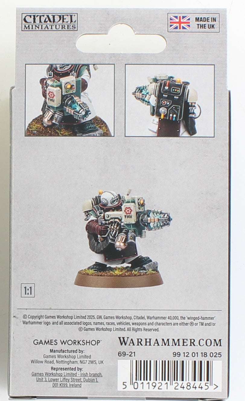Back of a Citadel Miniatures box shows a painted sci-fi armored figure with a medic symbol, holding a large energy weapon