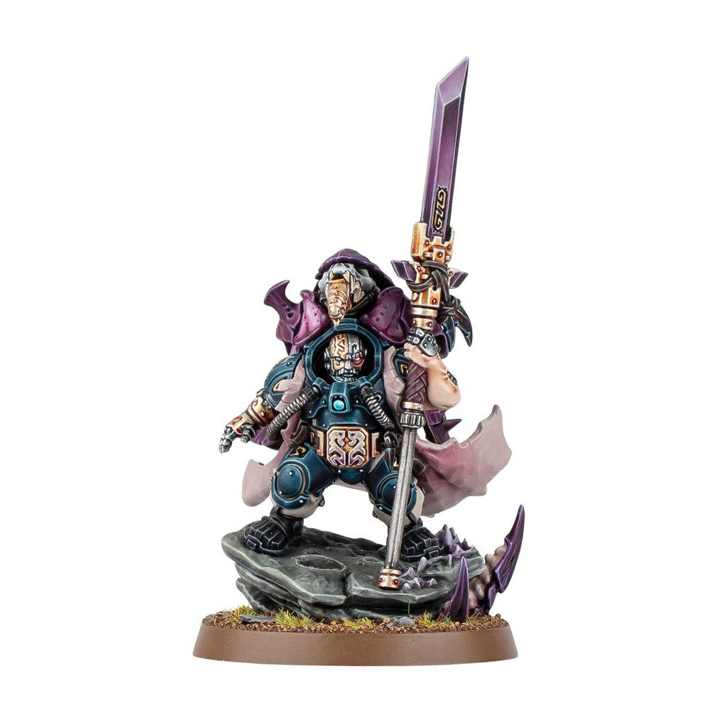 A detailed miniature of a hooded, teal armored warrior in a purple cape, holding a large purple sword with 'GUILD' inscribed, on a rocky base