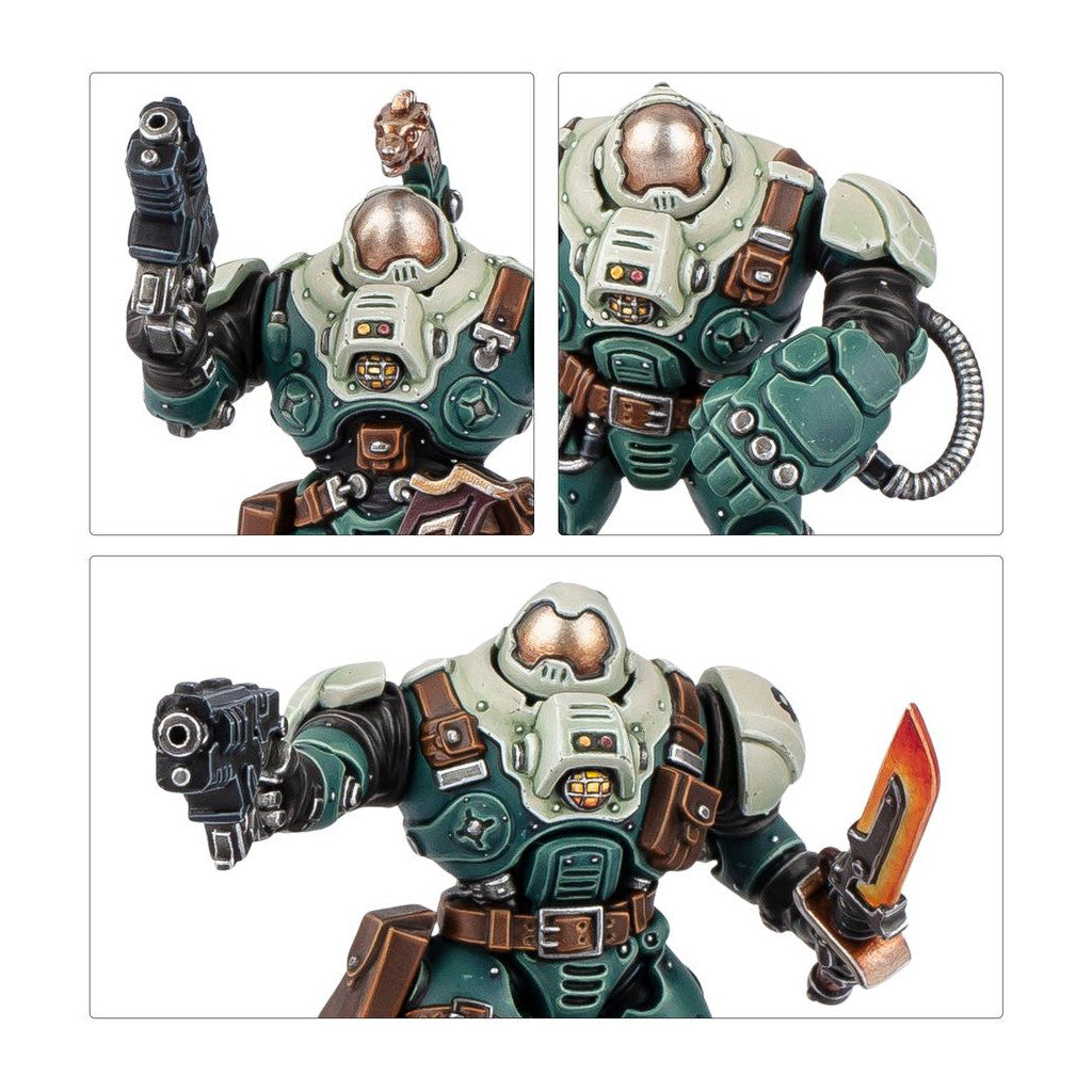 A miniature, heavily armored sci-fi figure in green and tan, holding a pistol and a combat blade