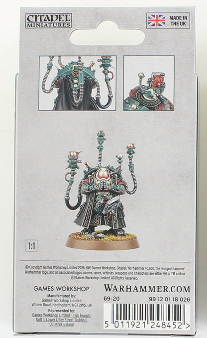 Packaging shows Painted Warhammer 40K Adeptus Mechanicus Tech-Priest miniature. It wears green armor, black robes, has multiple cybernetic arms