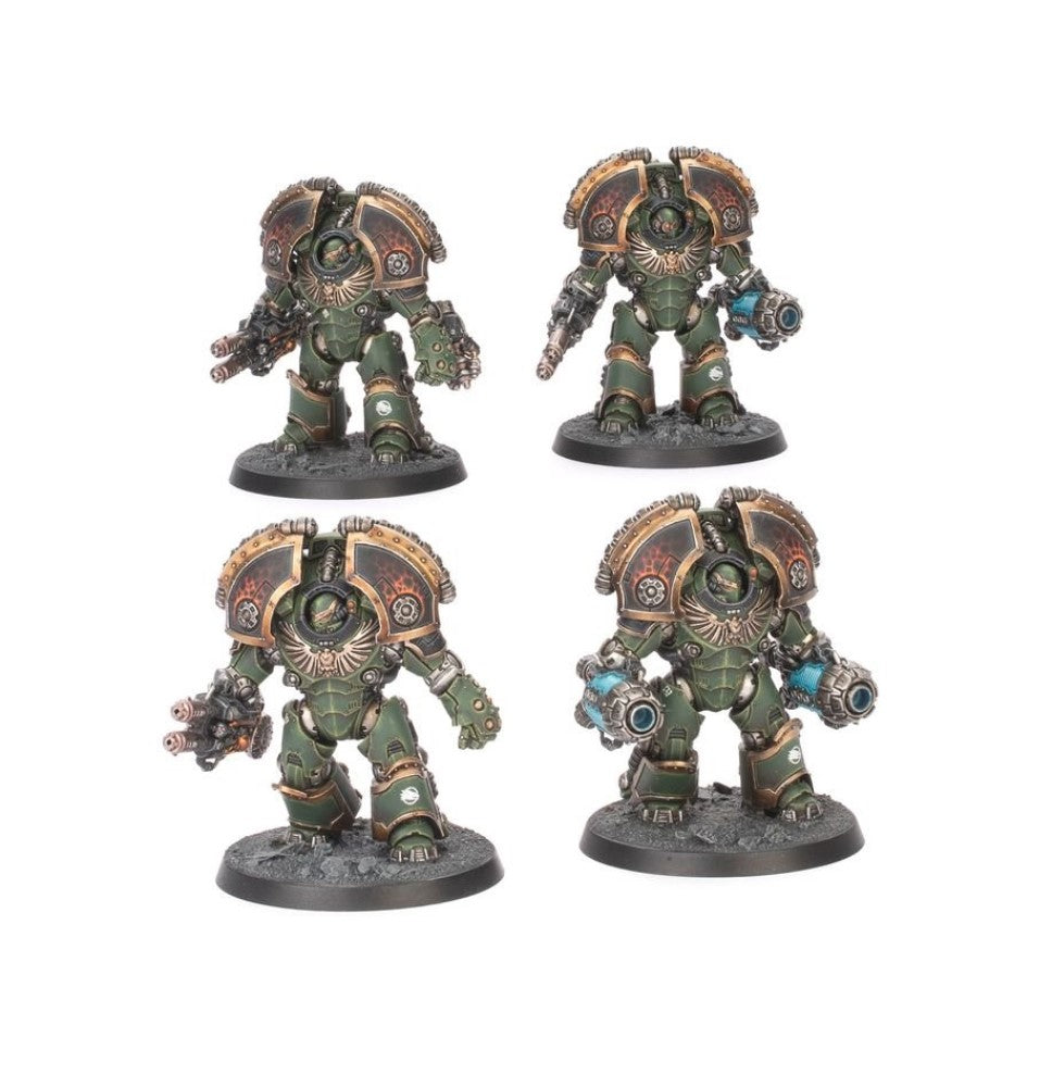 Four green and gold power-armored miniatures, armed with guns and energy weapons, standing on bases