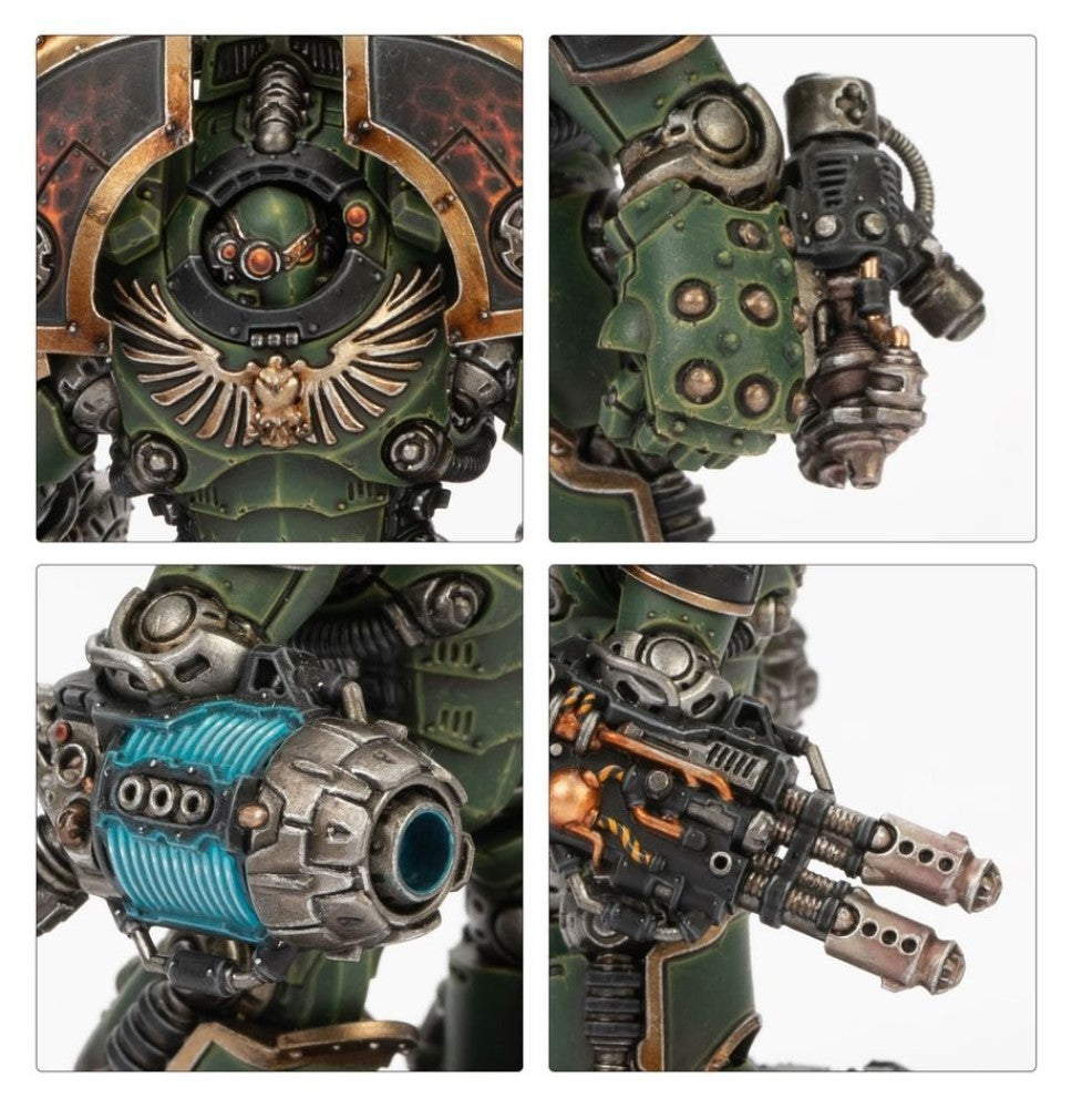 Green, heavily armored miniature warrior with glowing eye and skull emblem, holding a plasma gun, a twin autocannon, and a grenade launcher