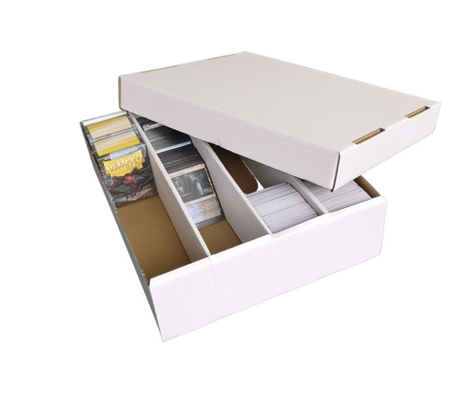White cardboard storage box with its lid ajar, revealing multiple stacks of trading cards organized in compartments.