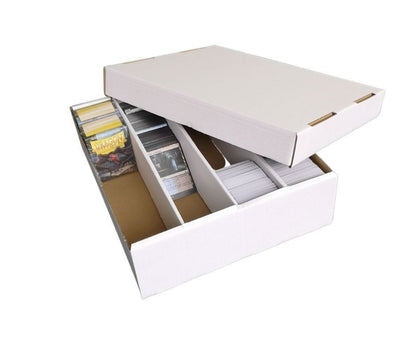 White cardboard storage box with its lid ajar, revealing multiple stacks of trading cards organized in compartments.
