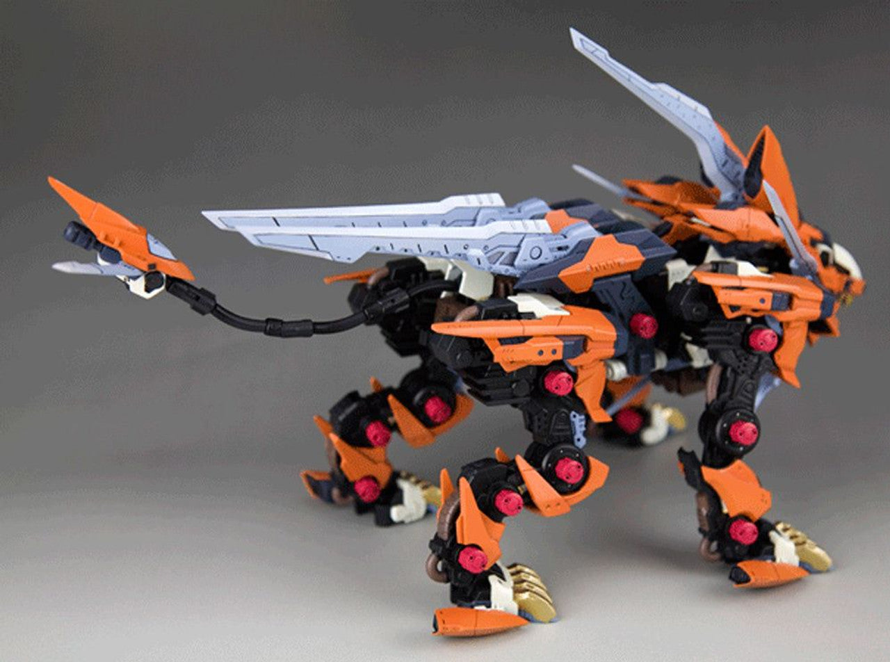 Orange and black mecha lion standing, with large blades on its back and a pincer-tipped tail