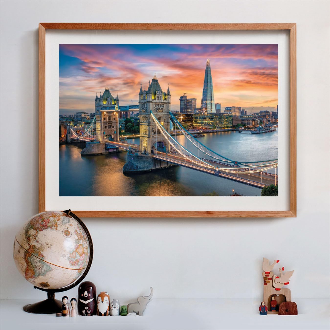Framed photo of illuminated Tower Bridge, The Shard, and London skyline at vibrant sunset