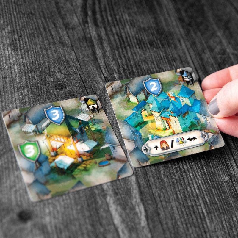 Close-up of thematic elements like garlic tokens and vampire lairs