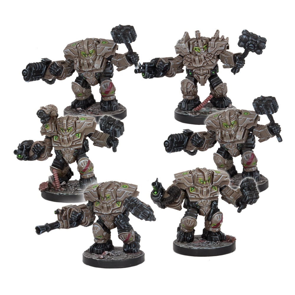 Six armored robot miniatures in tan and green, armed with hammers and guns, posed on bases.