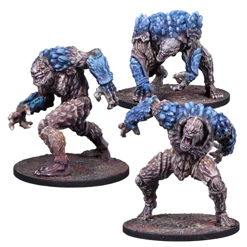 Three brown and blue crystalline monster miniatures in menacing poses on gaming bases