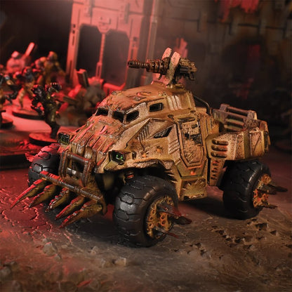 A rusty, spiked armored combat vehicle miniature with a top turret gun, on a red-lit battle scene