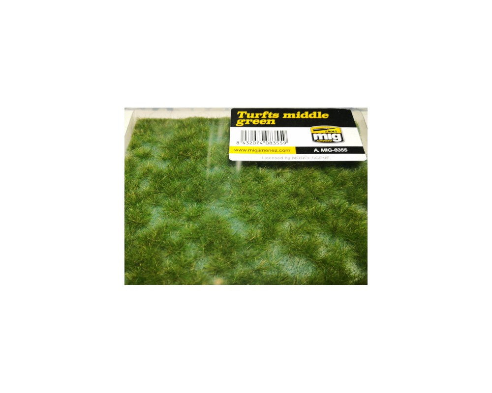 Box of middle green model scenery grass tufts by AMMO by MIG, labeled 'Turfts middle green'.