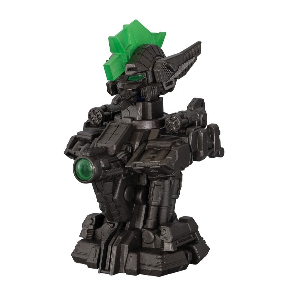 Dark gray robot figure with a green spiky crest, green eyes, a large green chest lens, and shoulder-mounted weapons