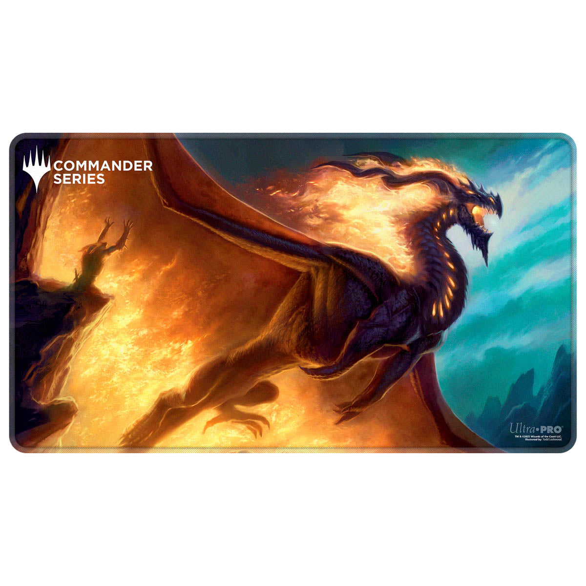 A Commander Series playmat shows a fiery dragon flying above a person reaching on a glowing orange cliff, under a blue sky