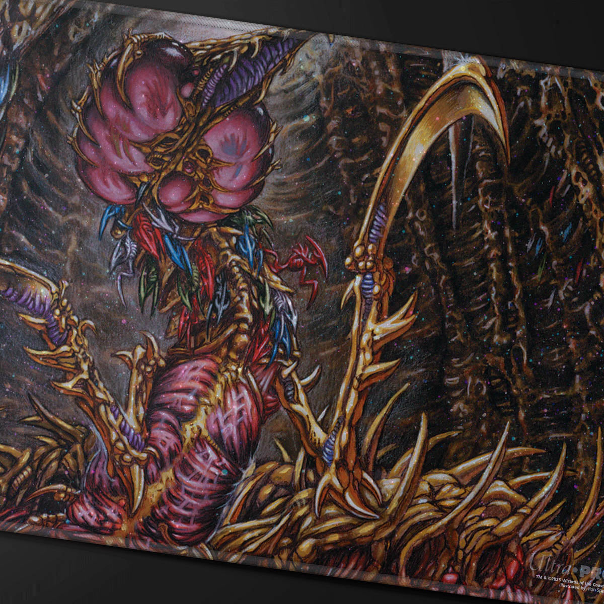 A multi-limbed, grotesque creature with a pink bulbous head, golden exoskeleton, and a large scythe-like arm in a dark cavern
