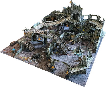 A detailed, multi-level fantasy dungeon tabletop terrain set. Features ruined stone structures, wooden bridges, stairs, and a grid map.