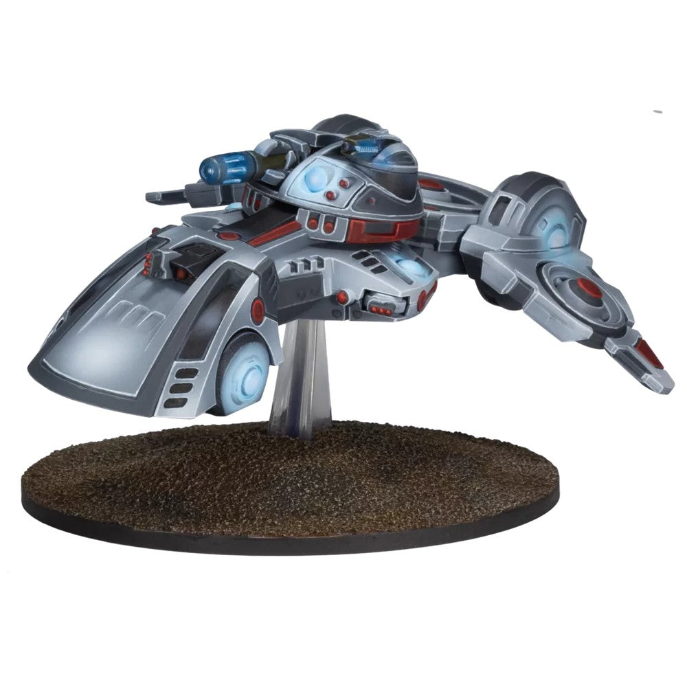 A grey sci-fi hovercraft model with blue lights and a top gun, on a display base