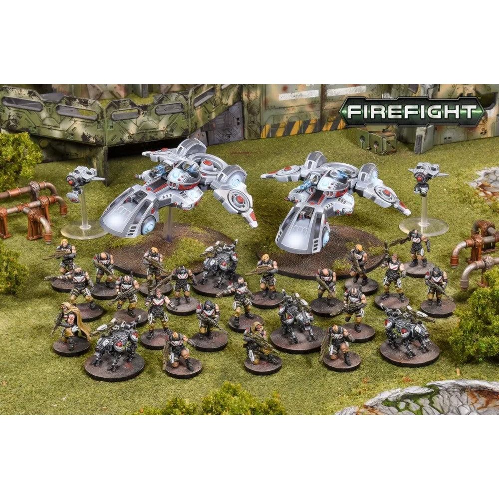 Painted sci-fi wargame miniatures: infantry, armored units and flying vehicles on a green battlefield, with "FIREFIGHT" logo