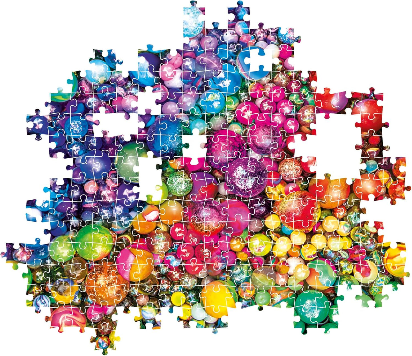 Partially completed jigsaw puzzle showing a vibrant pile of colorful, sparkling ornaments