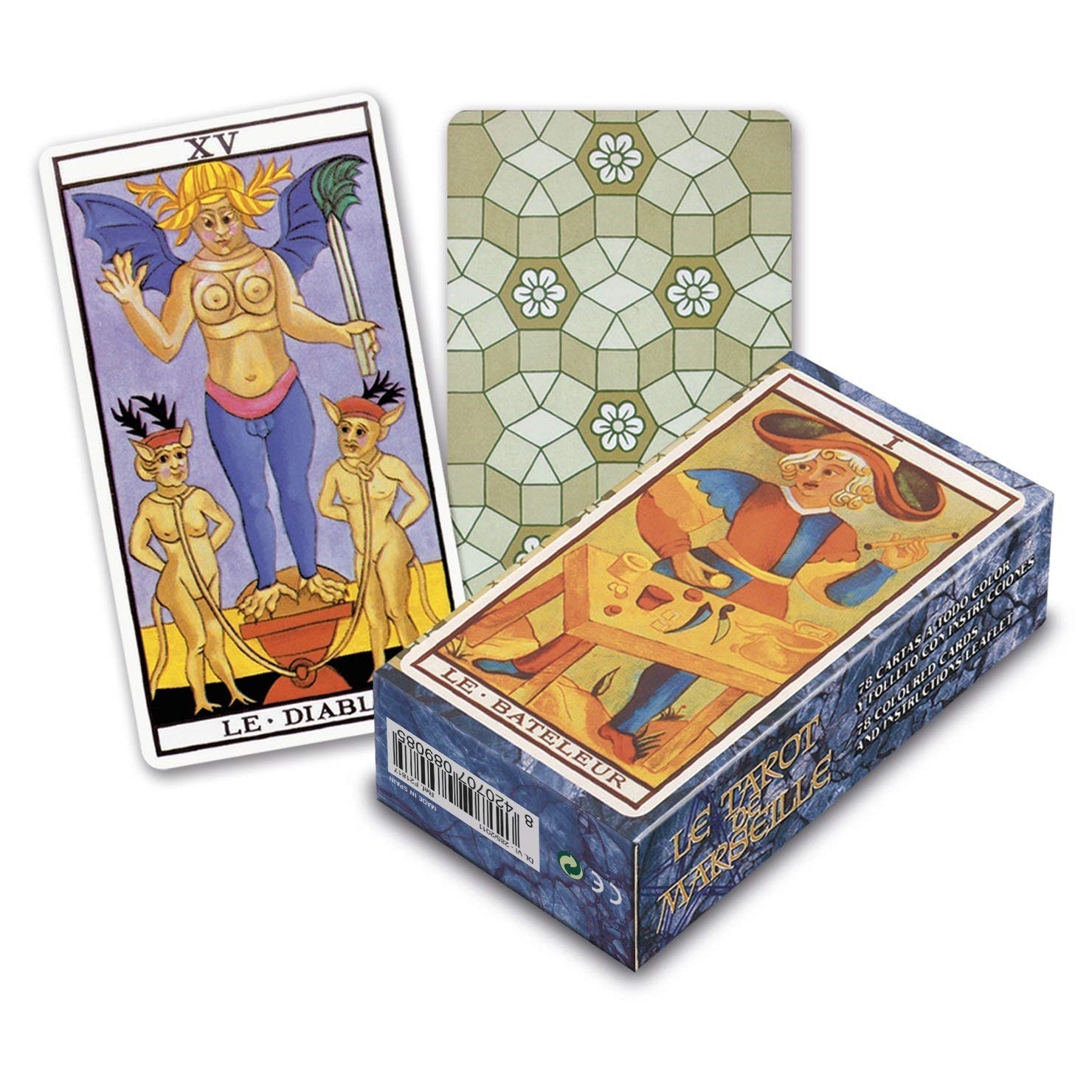 A Marseille Tarot deck box next to two cards, one showing the Le Diable card and the other displaying a patterned card back