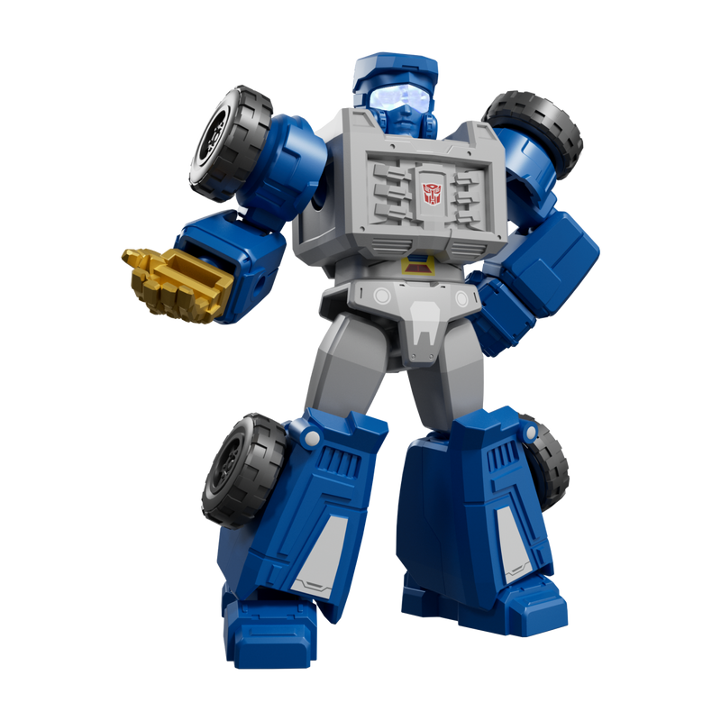 Blue and grey Transformers figure with large textured tires and gold hand detail