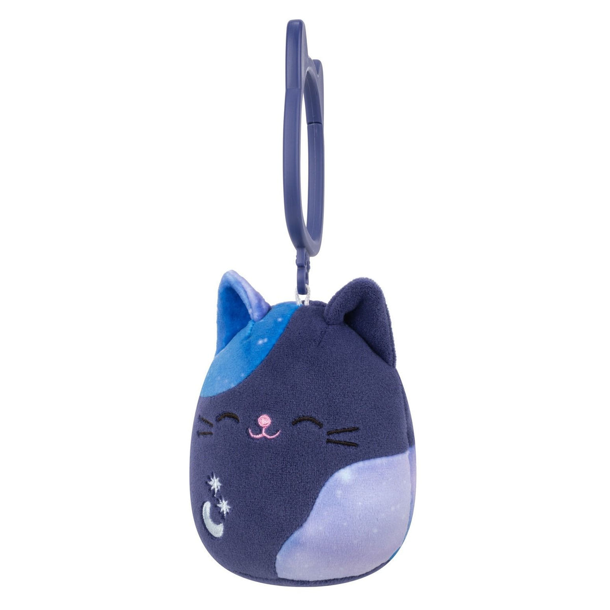 Side view of Dark blue plush cat keychain with celestial print spots, embroidered stars and moon, and a plastic cat-ear shaped clip