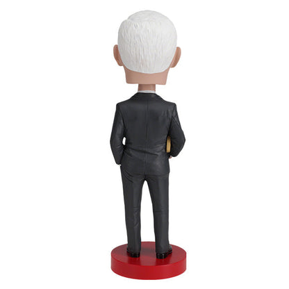 Royal Bobbles Mike Pence bobblehead figurine in a dark suit on a red base back view