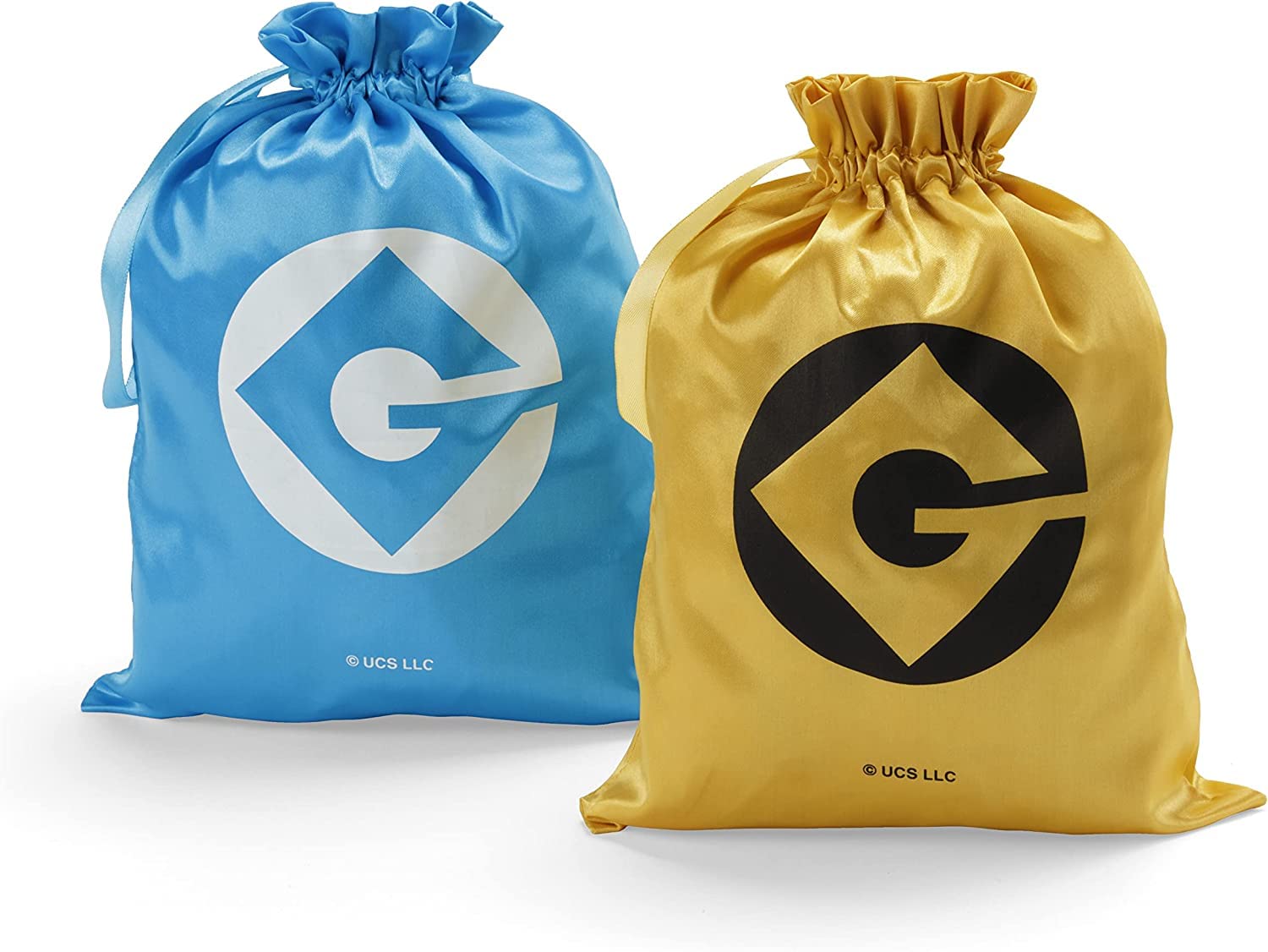 Two Despicable Me drawstring bags: blue with a white Gru logo, and gold with a black Gru logo