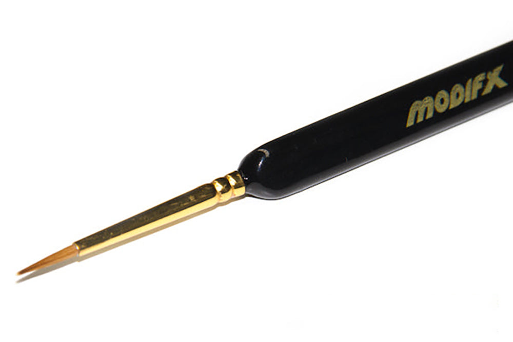 MODIFX black fine detail paintbrush with gold ferrule and pointed brown bristles on a white background