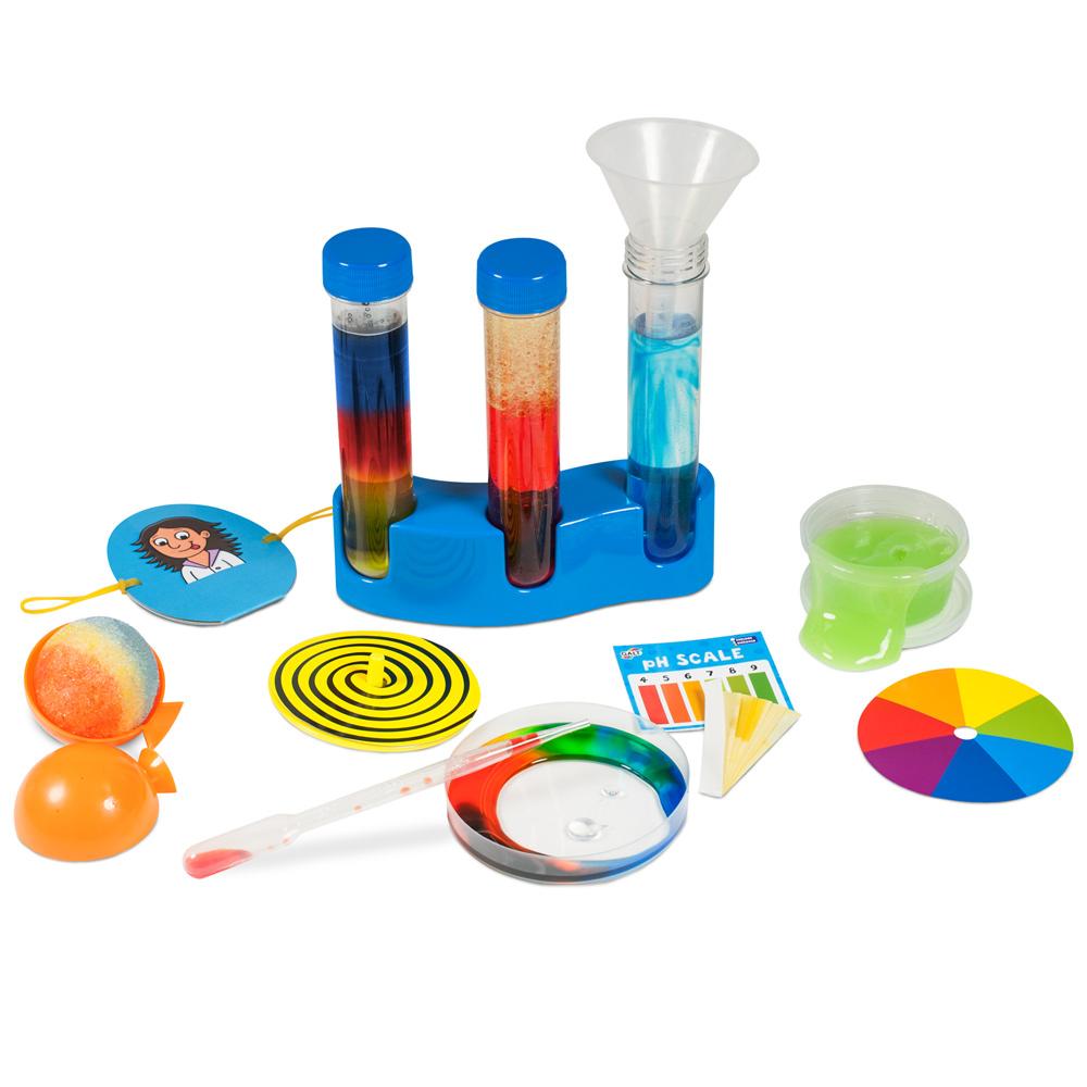 Colourful children's chemistry set with test tubes of liquids, pH scale, dropper, and experiment items
