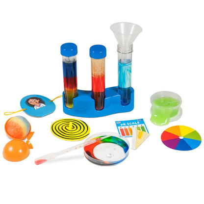 Colourful children's chemistry set with test tubes of liquids, pH scale, dropper, and experiment items