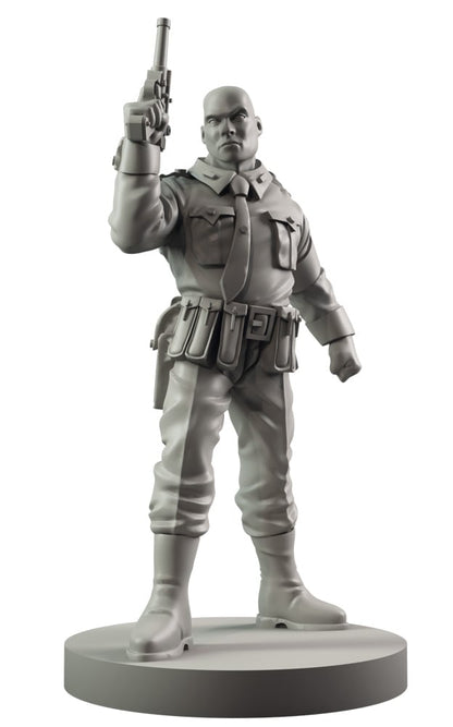 A grey statue of a stern bald man in a military uniform, holding a pistol pointed skyward