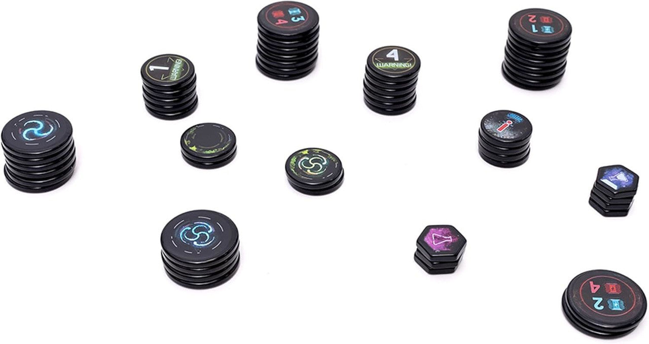 Stacks of black circular and hexagonal game tokens with colorful symbols and numbers, arranged on white