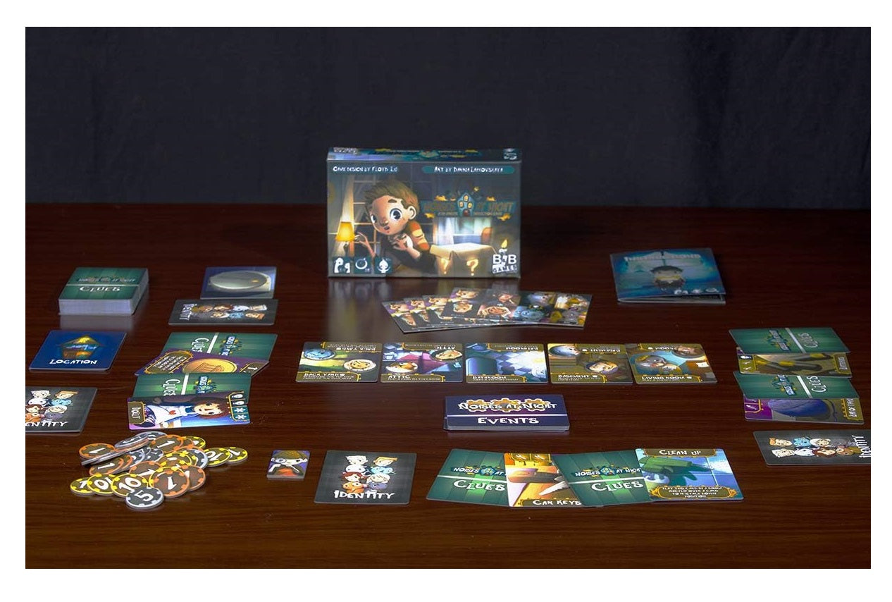 Noises at Night board game laid out on a wooden table: game box with cartoon art, clue/location cards, and numbered tokens.