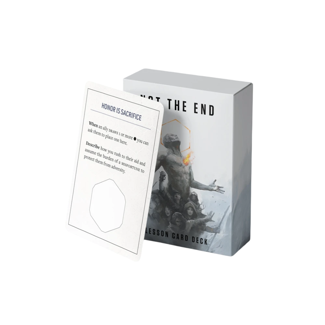 A Not The End Lesson Card Deck box shows a man with a glowing chest and people, with a card titled Honor Is Sacrifice resting against it
