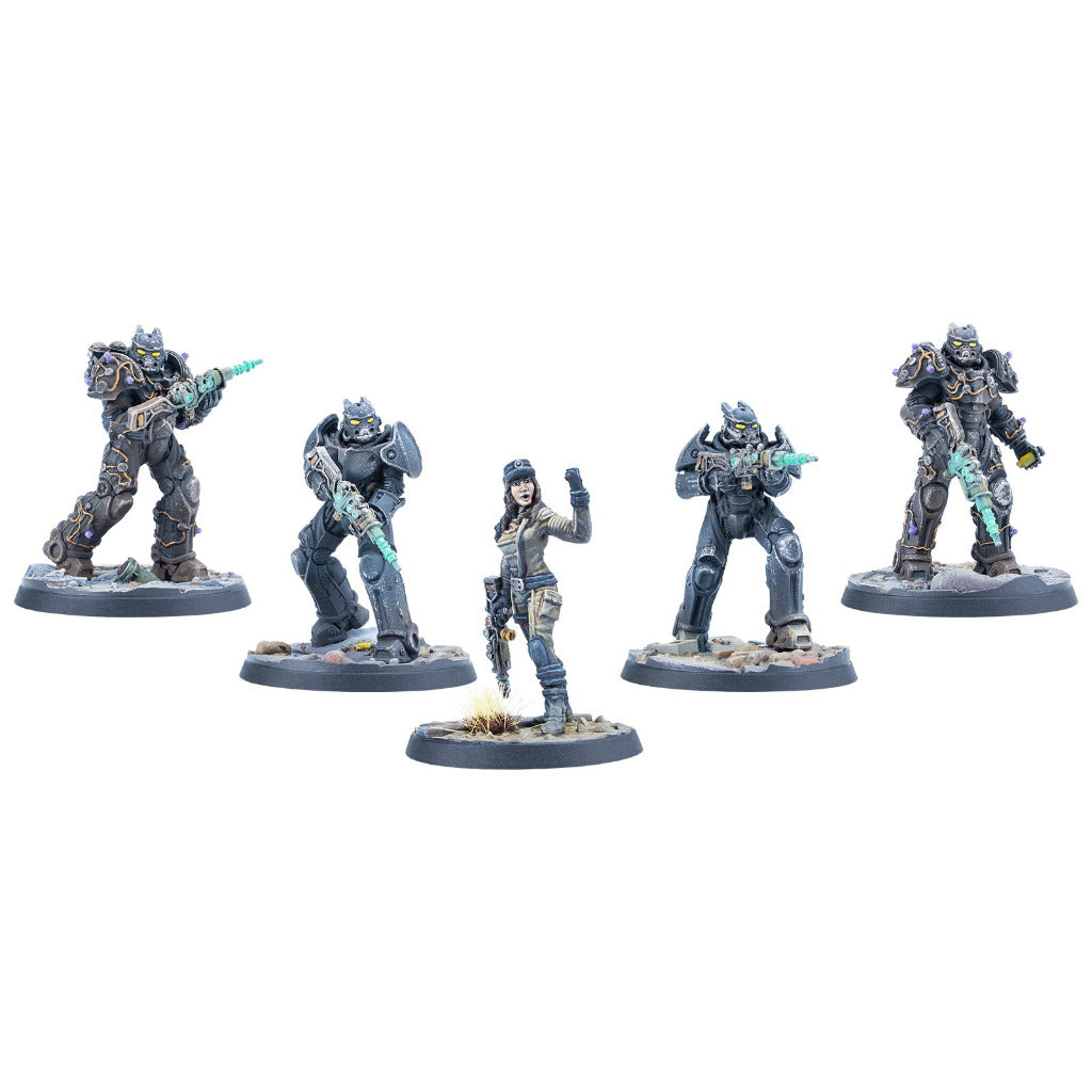 Five painted sci-fi miniatures. Four armored figures wield glowing rifles; one female readies a pistol.