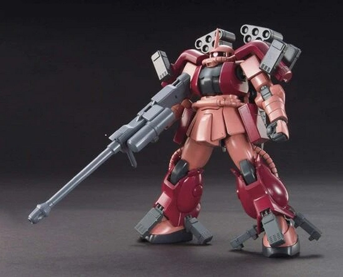 Maroon Zaku mobile suit model holding a long grey rifle and equipped with shoulder missile pods