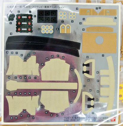 Model kit stickers for the One Piece Spade Pirates' ship, featuring various beige and black components ready for assembly