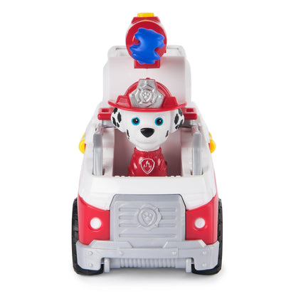 Paw Patrol Marshall Dalmatian pup toy in a red and white fire truck, wearing his firefighter uniform and helmet, with a blue water cannon on top