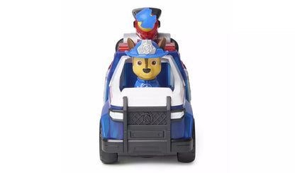 Paw Patrol Chase toy in blue police uniform and helmet, driving a blue police truck with a water cannon