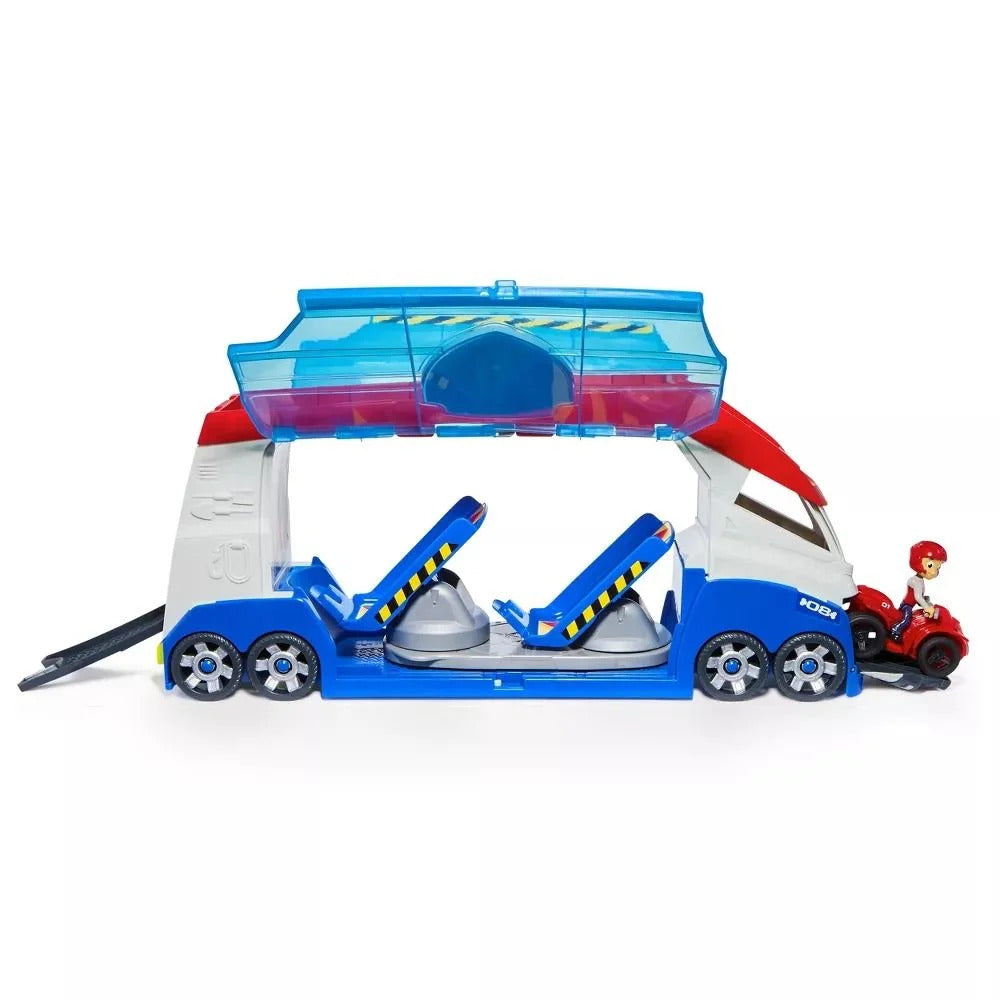 Paw Patrol transforming truck toy: blue, red, white vehicle, open cargo, two launch seats, Ryder on red ATV